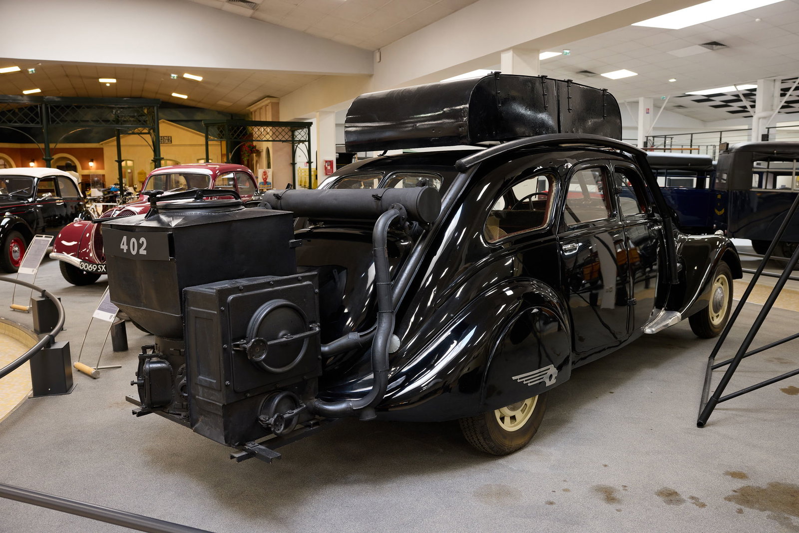 This Wood-Powered Limo Might Be The Oddest Car In Peugeot's Museum